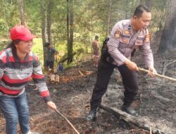 Aksi Cepat Polres Tator Bersama Tim Gabungan Padamkan Kebakaran Lahan di Makale