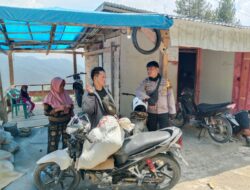 Bhabinkamtibmas Polsek Rongkong Laksanakan Patroli dan Pantau Situasi Jalan Poros di Desa Minanga